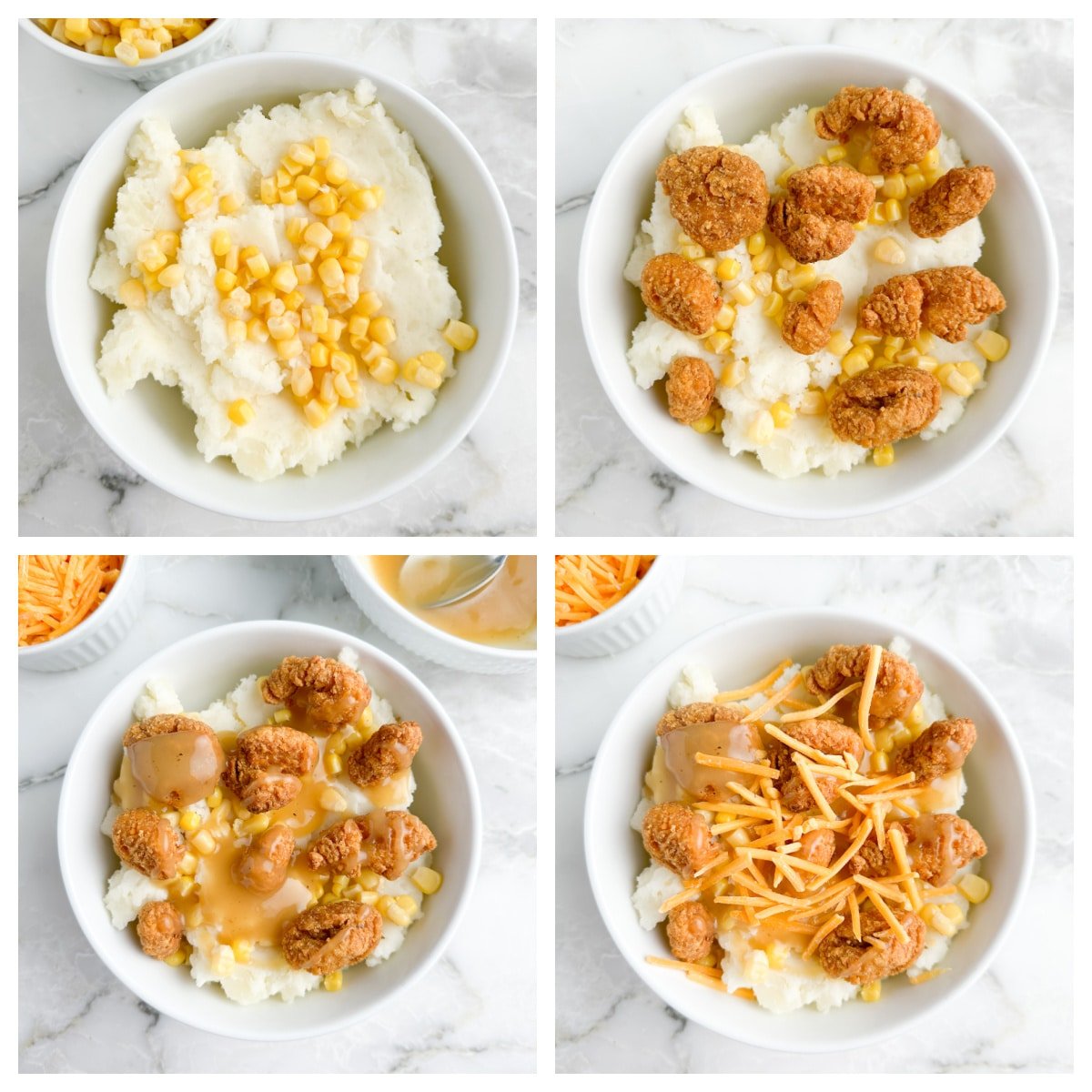 Bowl of mashed potatoes, corn, popcorn chicken, and shredded cheese.