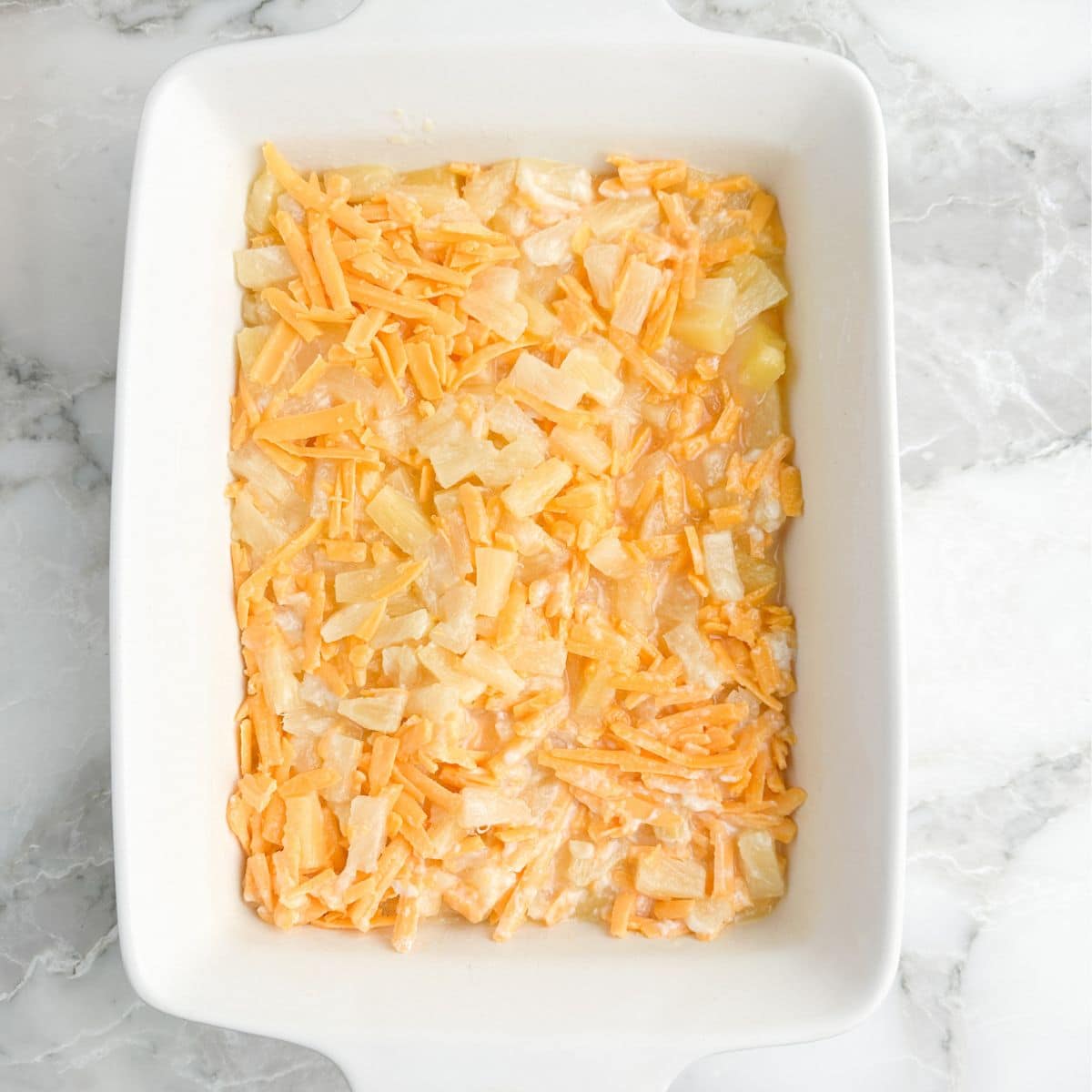 Casserole dish with pineapple casserole. 