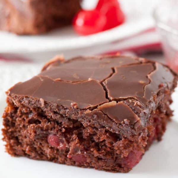 Piece of chocolate cake on a plate.