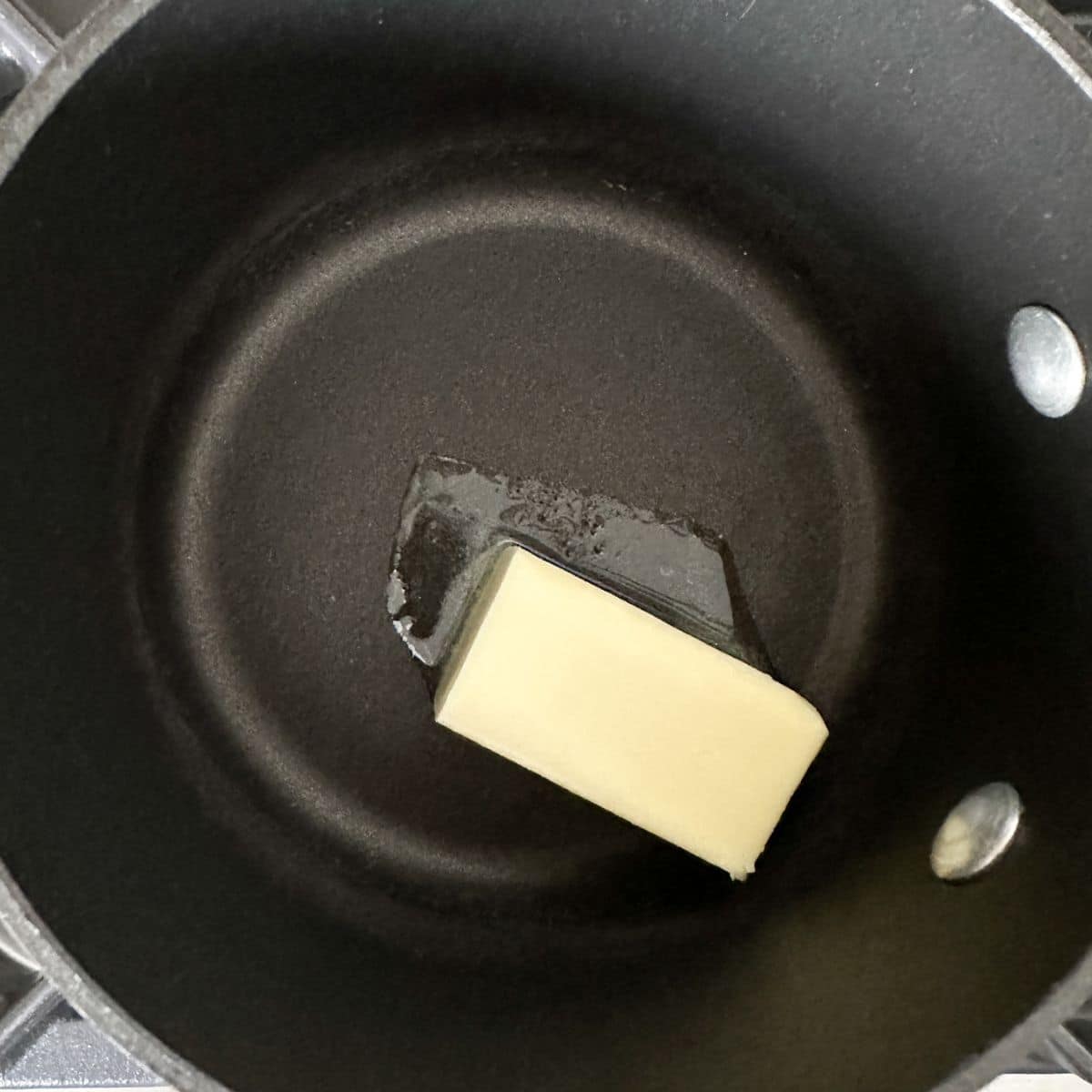 Butter in a saucepan. 