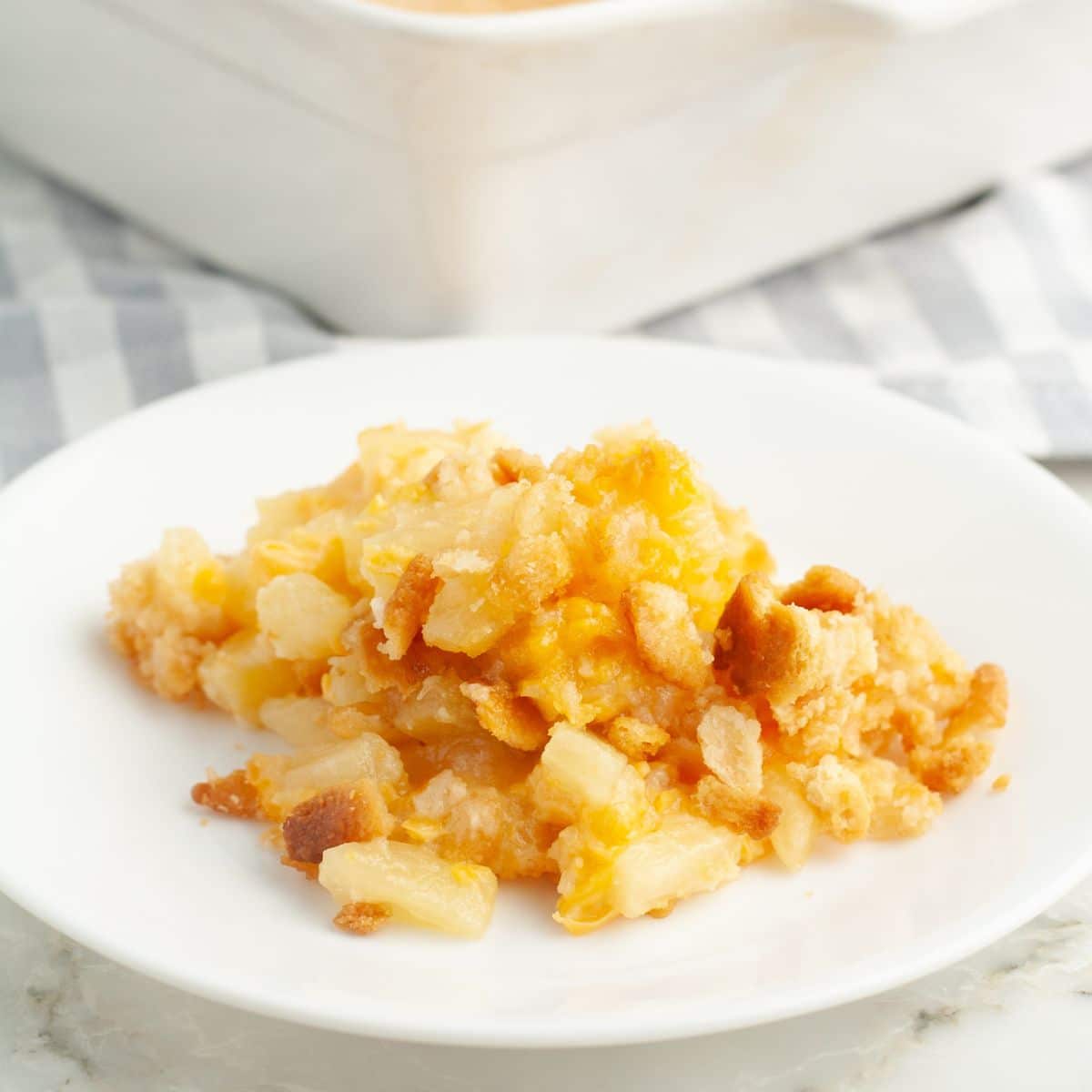 Plate of pineapple casserole. 