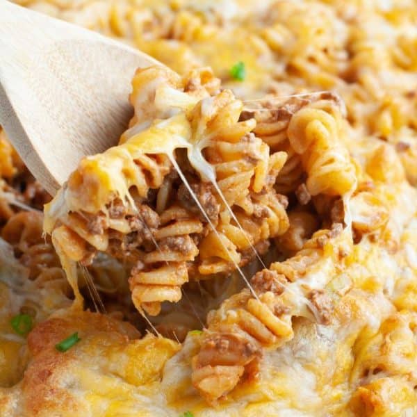 Pasta casserole with wooden spoon.