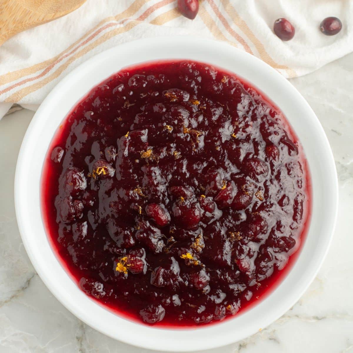 Bowl filled with cranberry sauce. 