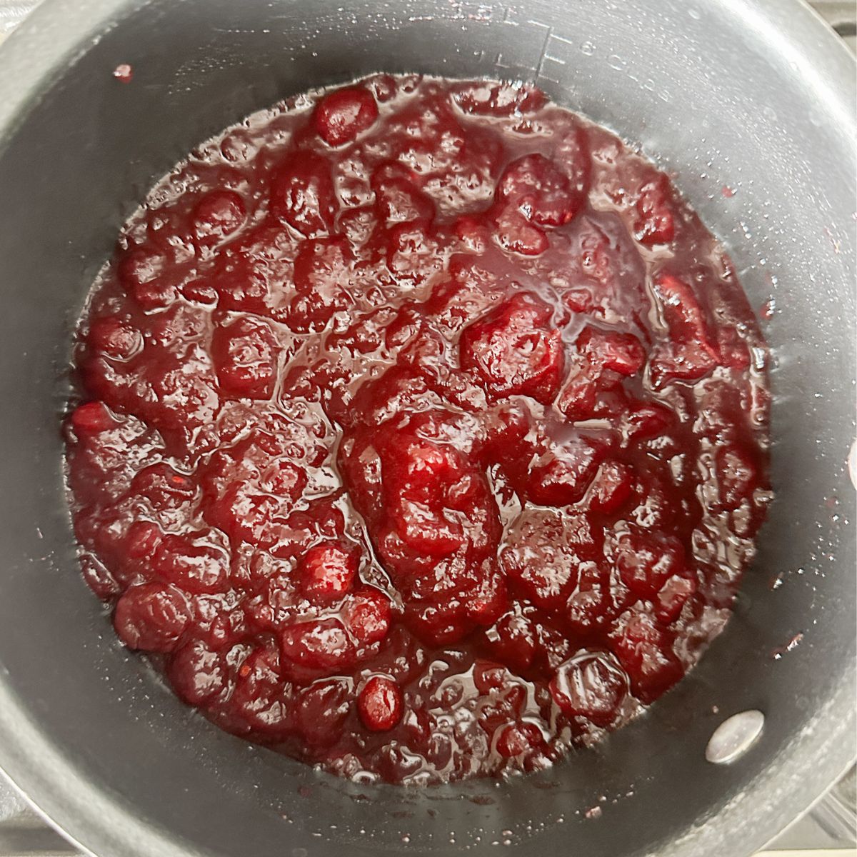 Pot with cranberry sauce. 