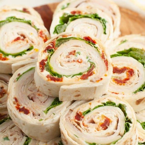 Turkey roll-ups on a plate.