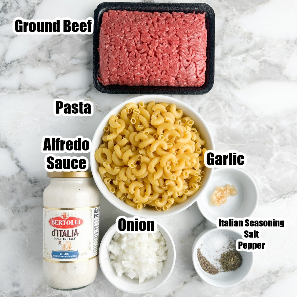 Ground beef, elbow noodles, jar of alfredo, diced onion, and seasonings.