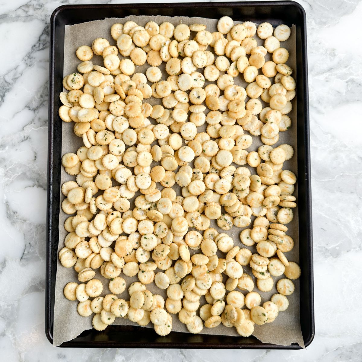 Baking sheet with oyster crackers. 