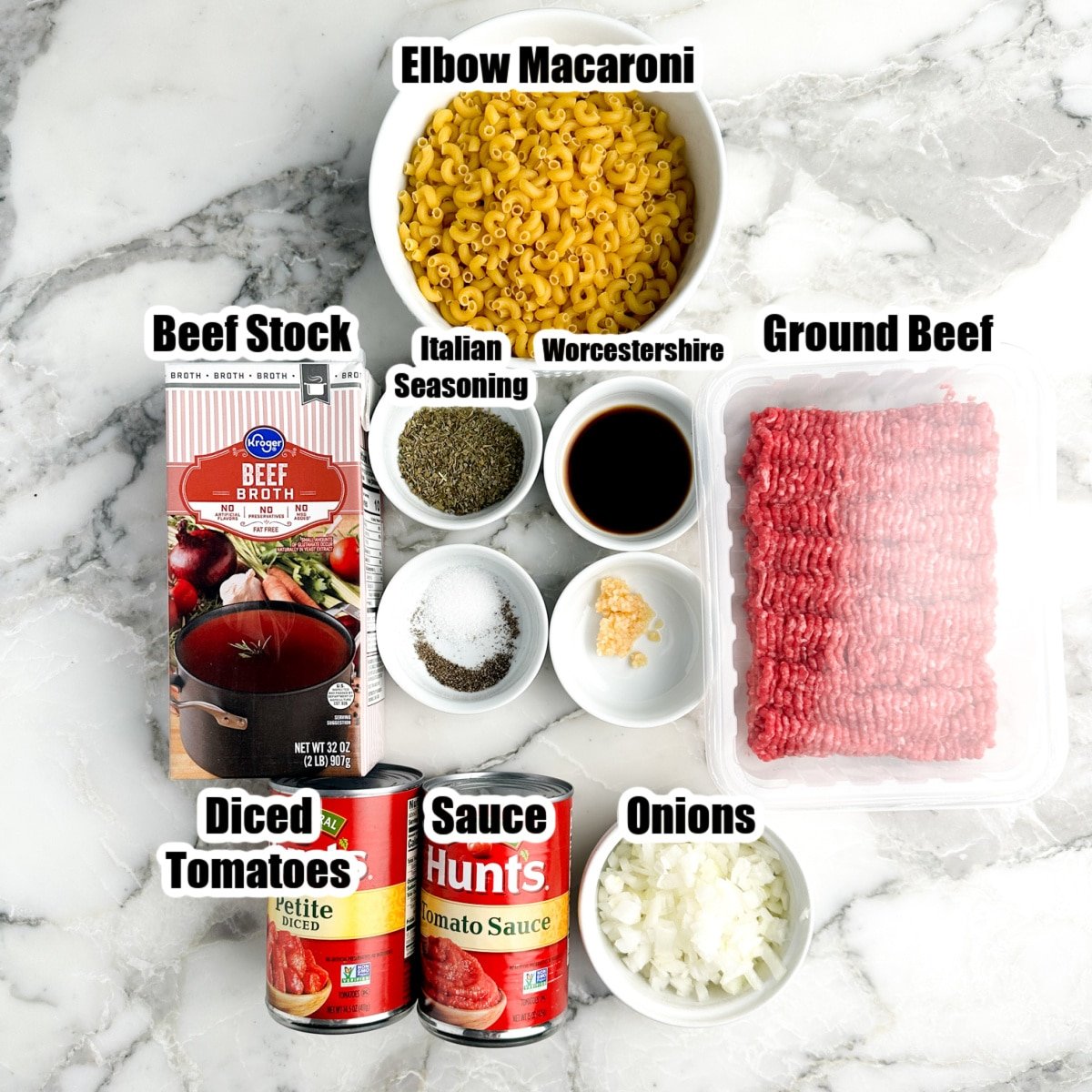 Bowl of pasta, ground beef, stock, seasonings, tomato sauce and diced tomatoes. 