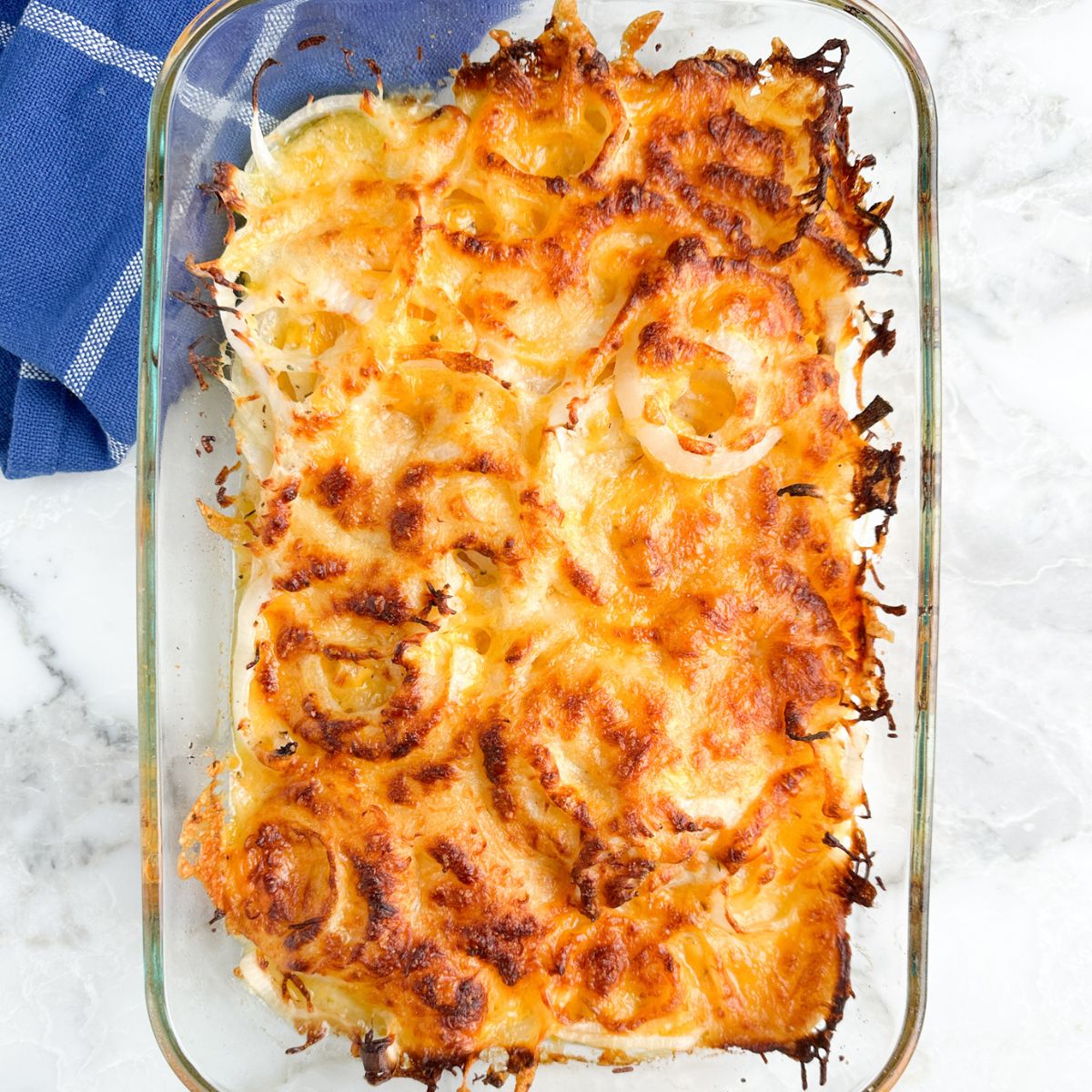 Baking dish with cheesy onions. 