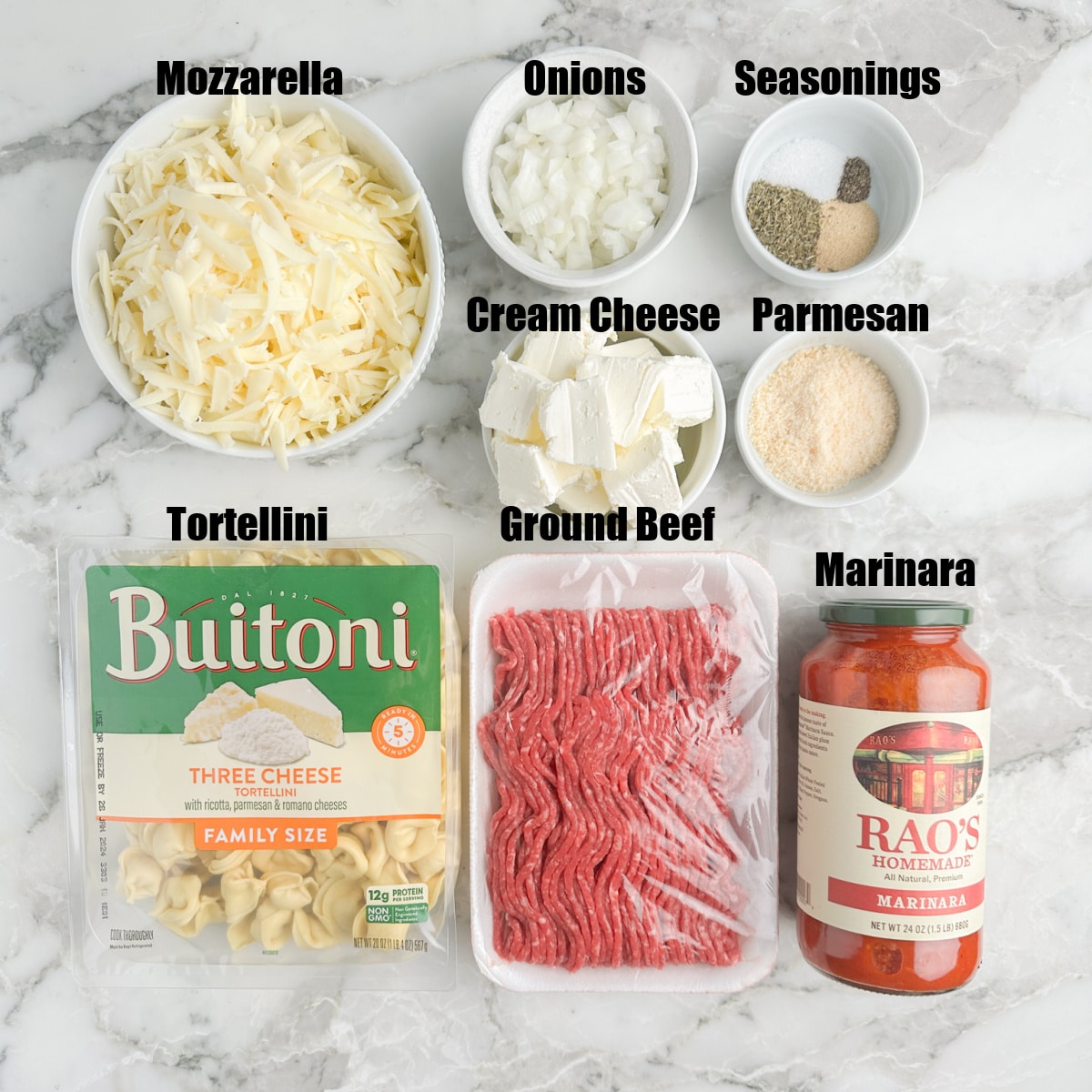 Tortellini, ground beef, bowl of cheese, marinara, and seasonings. 