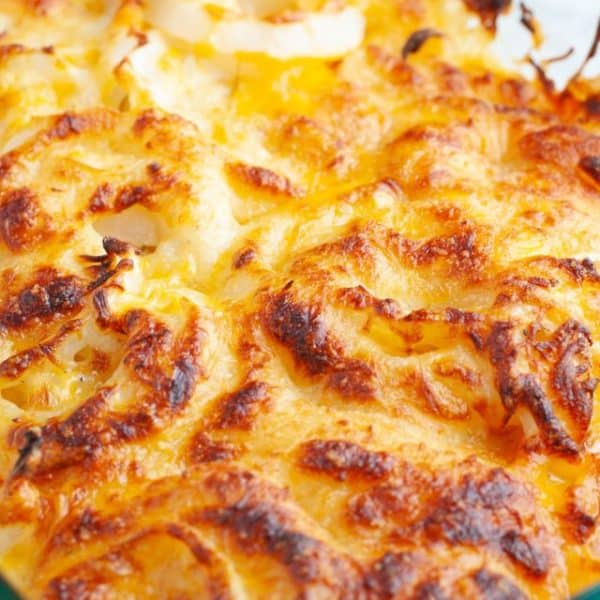 Casserole dish with baked onions and cheese.