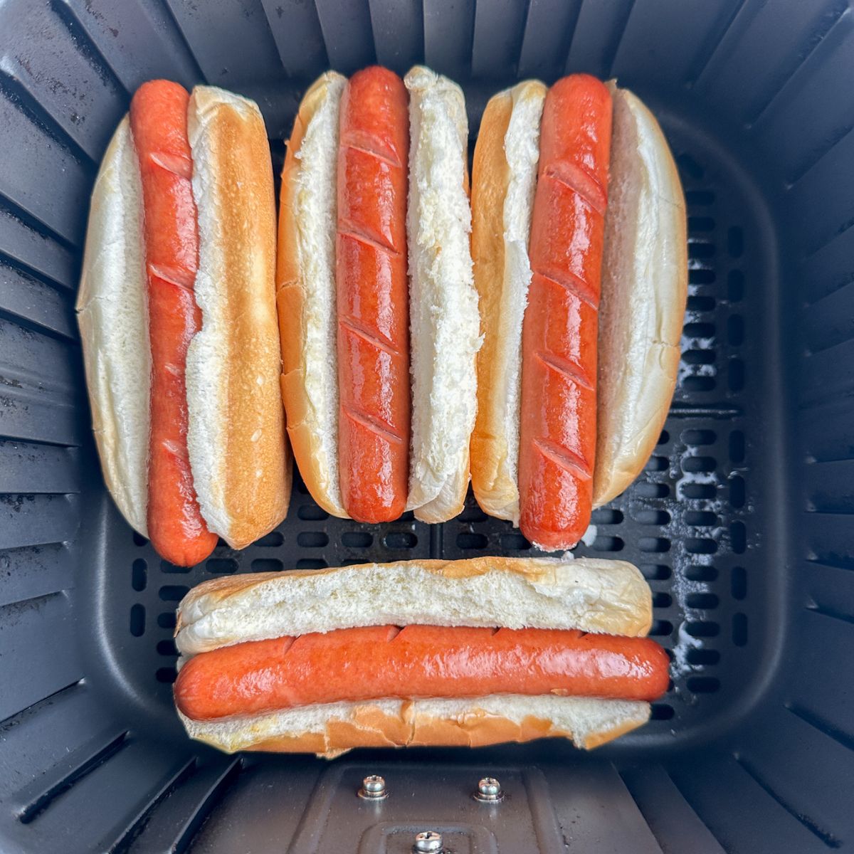 Hot dogs in buns in the air fryer. 