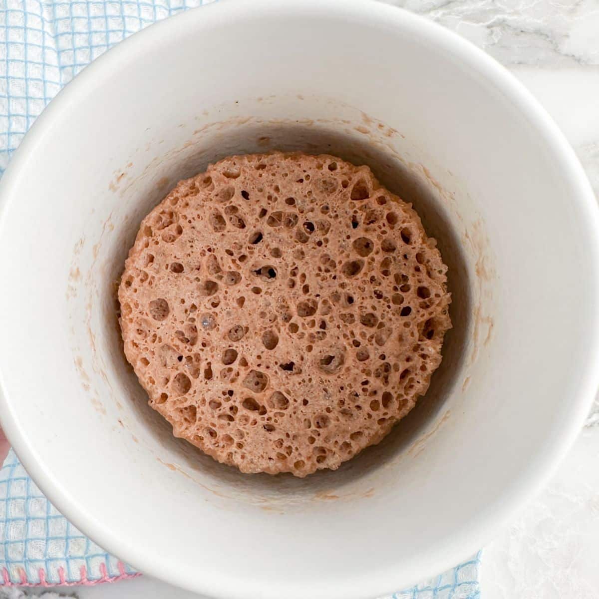 Mug with chocolate cake. 