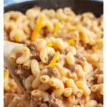 Skillet with cheesy beef macaroni and cheese.
