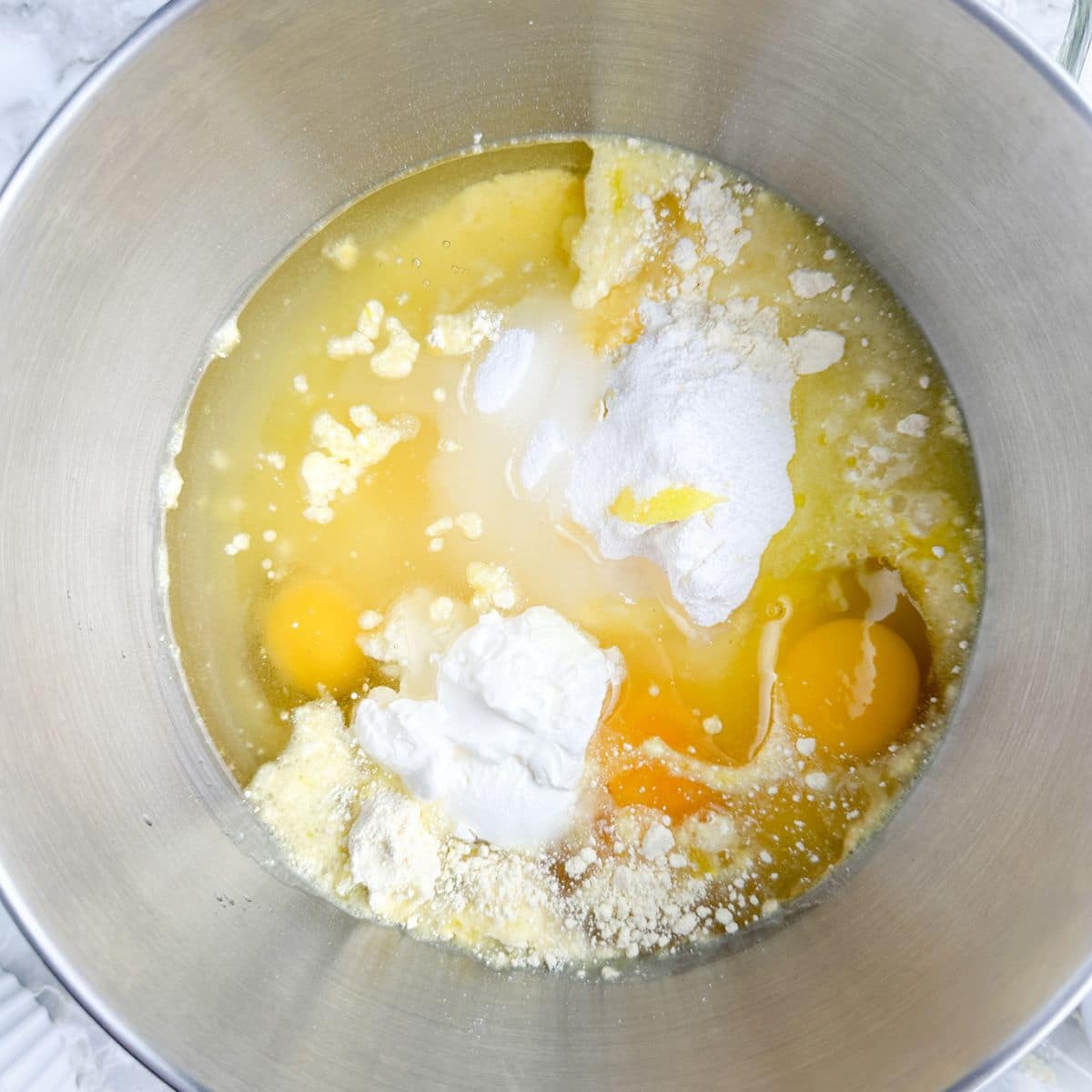 Mixing bowl with eggs, cake mix, and oil. 