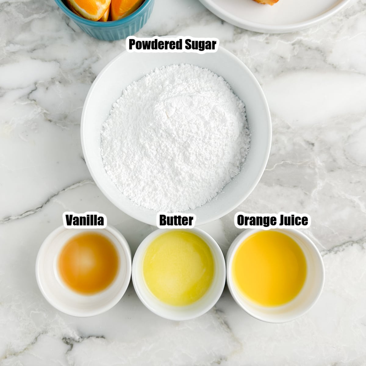 Bowl of powdered sugar, vanilla, melted butter, and orange juice. 