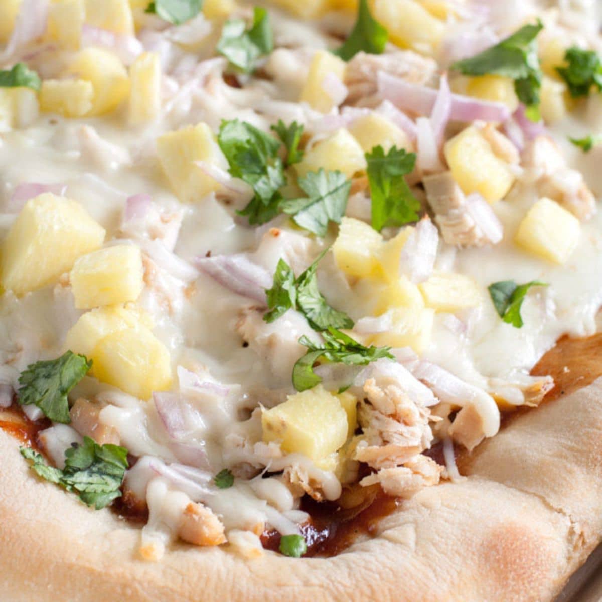 Sheet pan BBQ chicken pizza in a pan. 