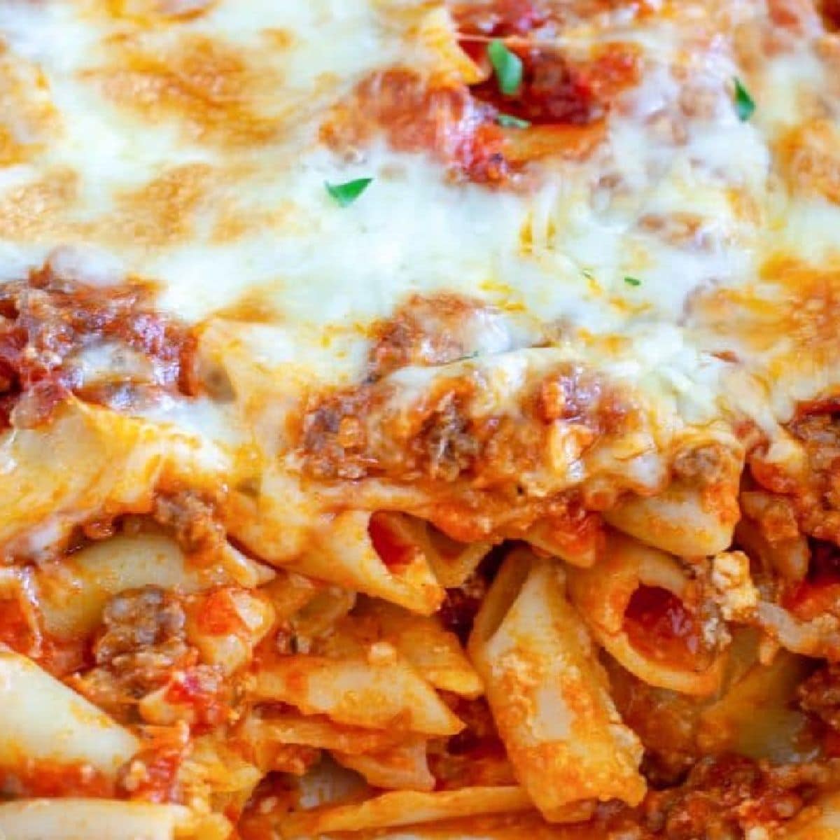 Baked pasta with sausage and melted cheese. 