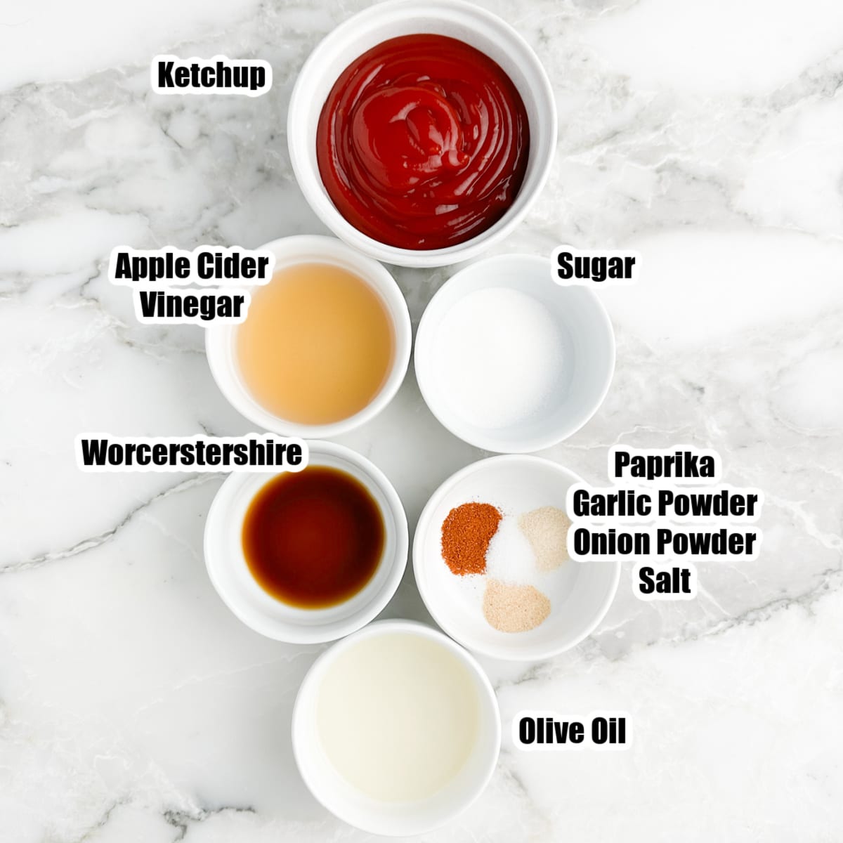 Bowl of ketchup, vinegar, sugar, worcestershire, seasonings, and oil.