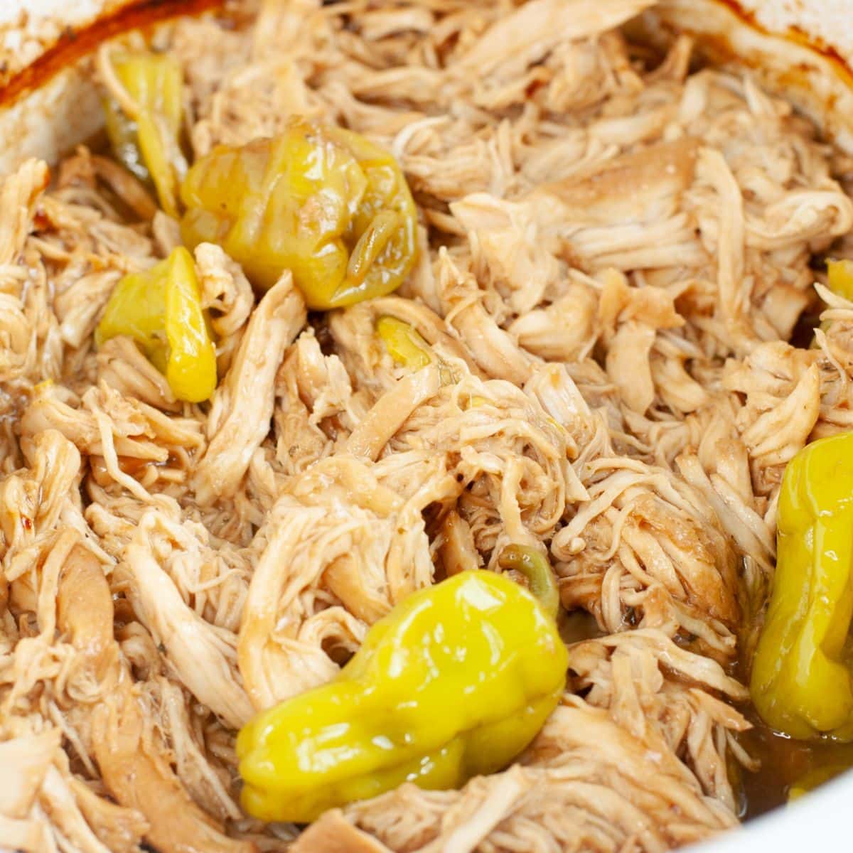 Slow cooker with Mississippi chicken.