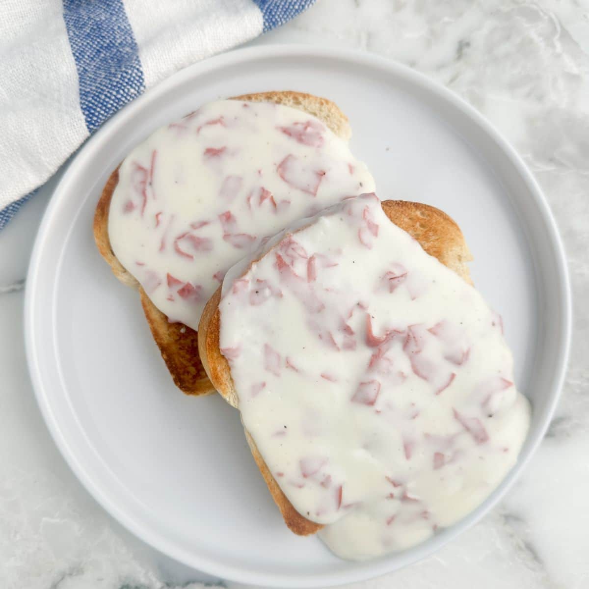 Plate with chipped beef on toast.