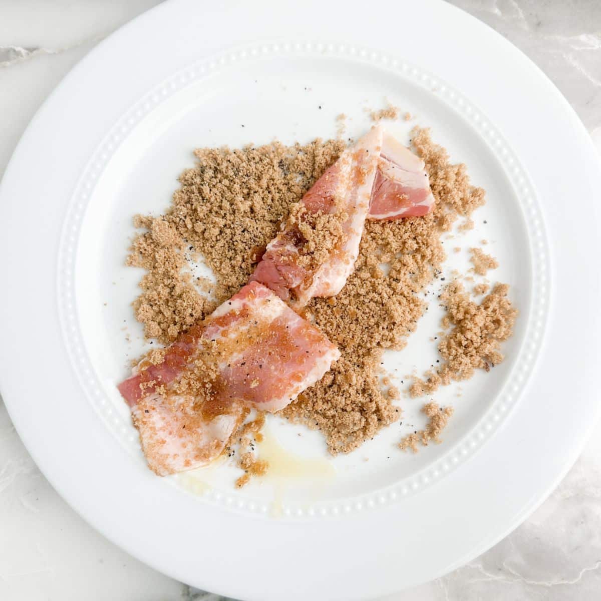 Plate with brown sugar and bacon.
