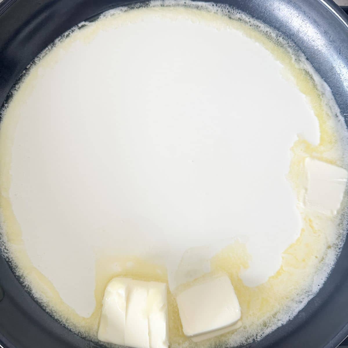 Skillet with cream and butter.