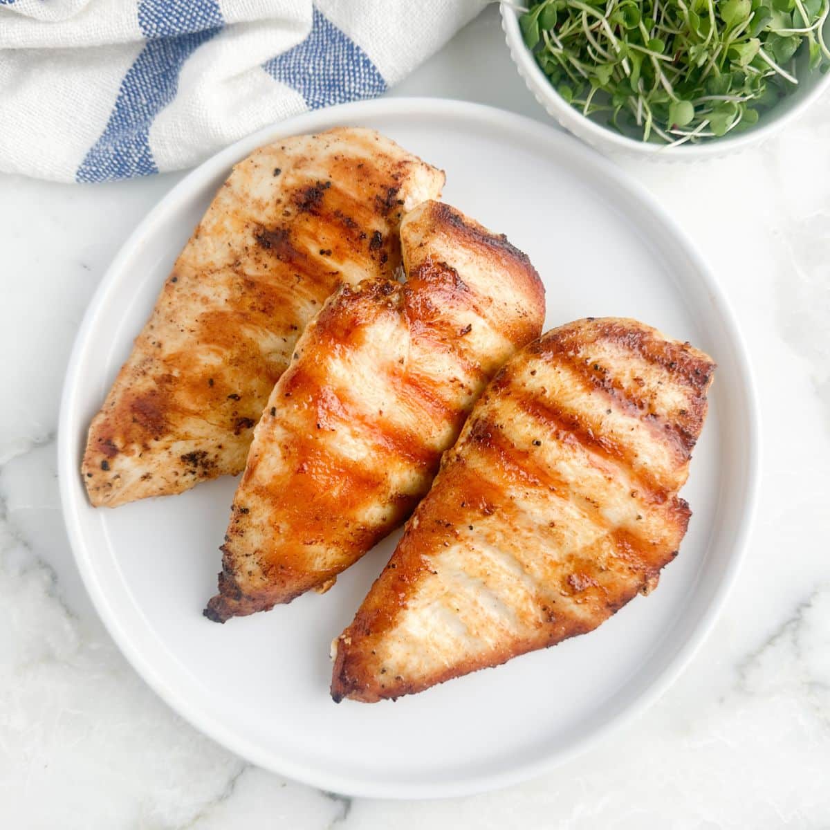 Plate with grilled chicken.