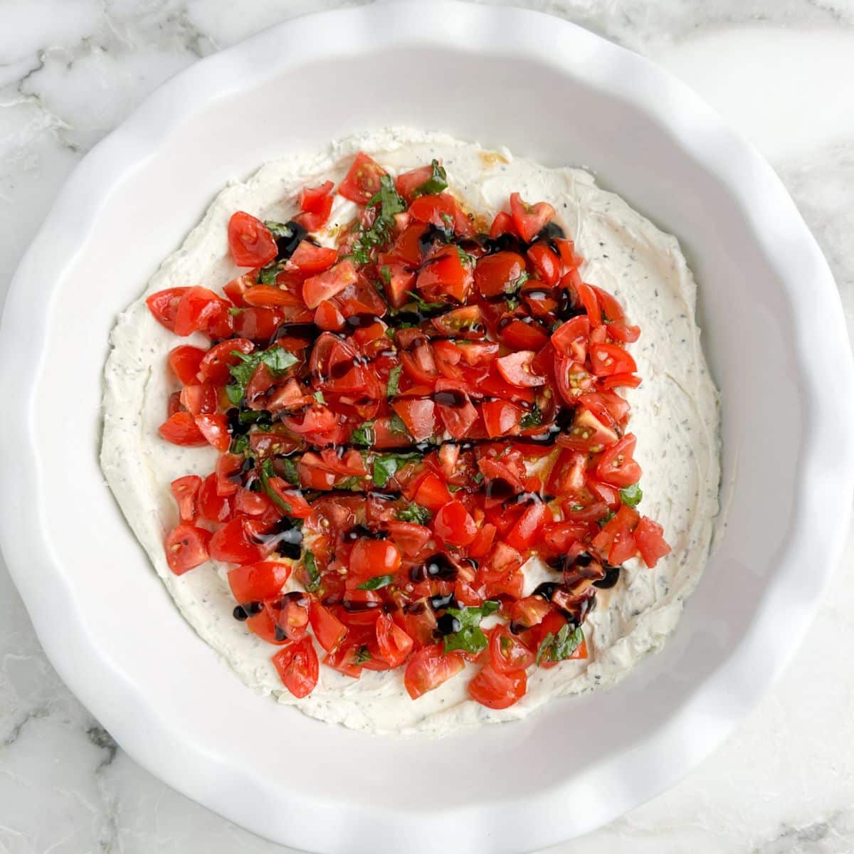Dish with bruschetta dip. 