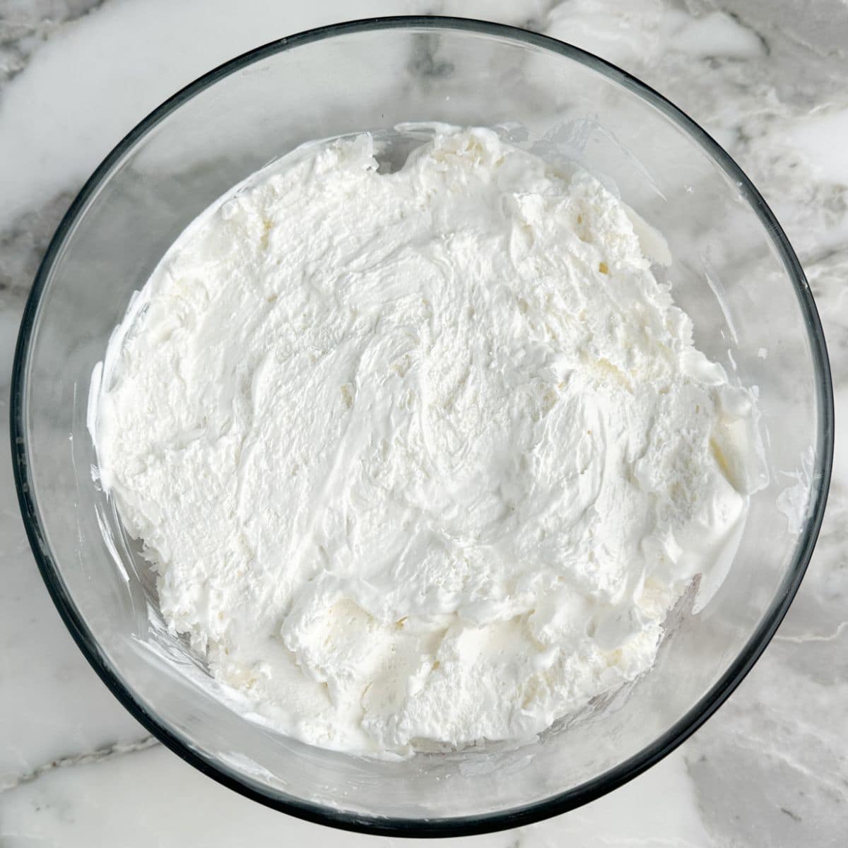Bowl with whipped topping.
