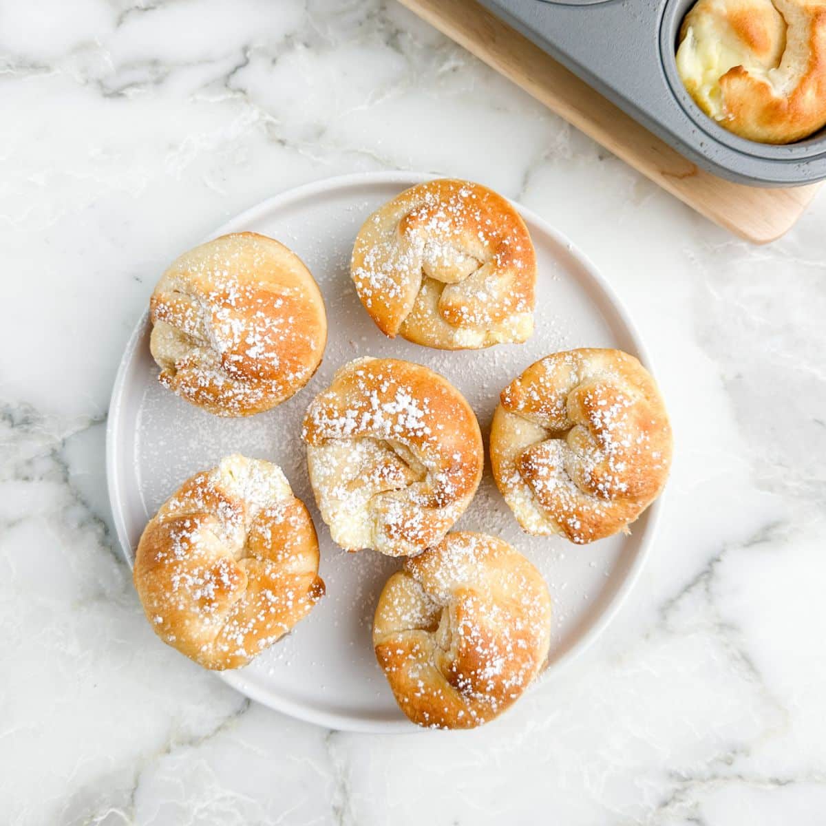 Peach crescent bites on a plate.