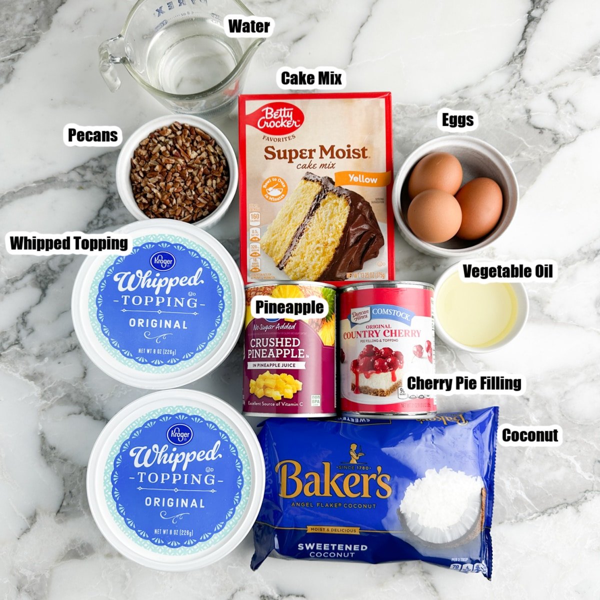 Cake mix, eggs, pecans, shredded coconut, whipped topping, cherry pie filling, and crushed pineapple.