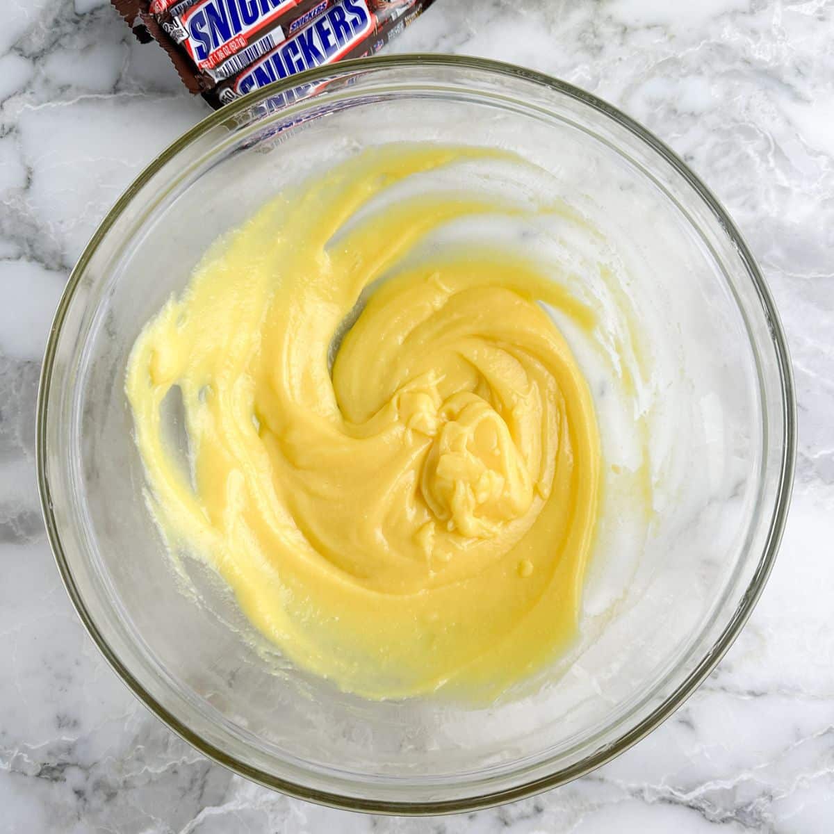Bowl of vanilla pudding.