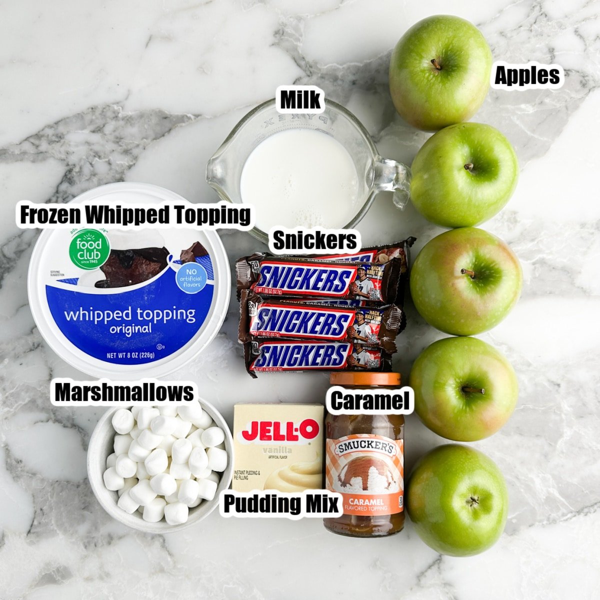 Green apples, milk, Snickers, caramel sauce, pudding mix, marshmallows, whipped topping.