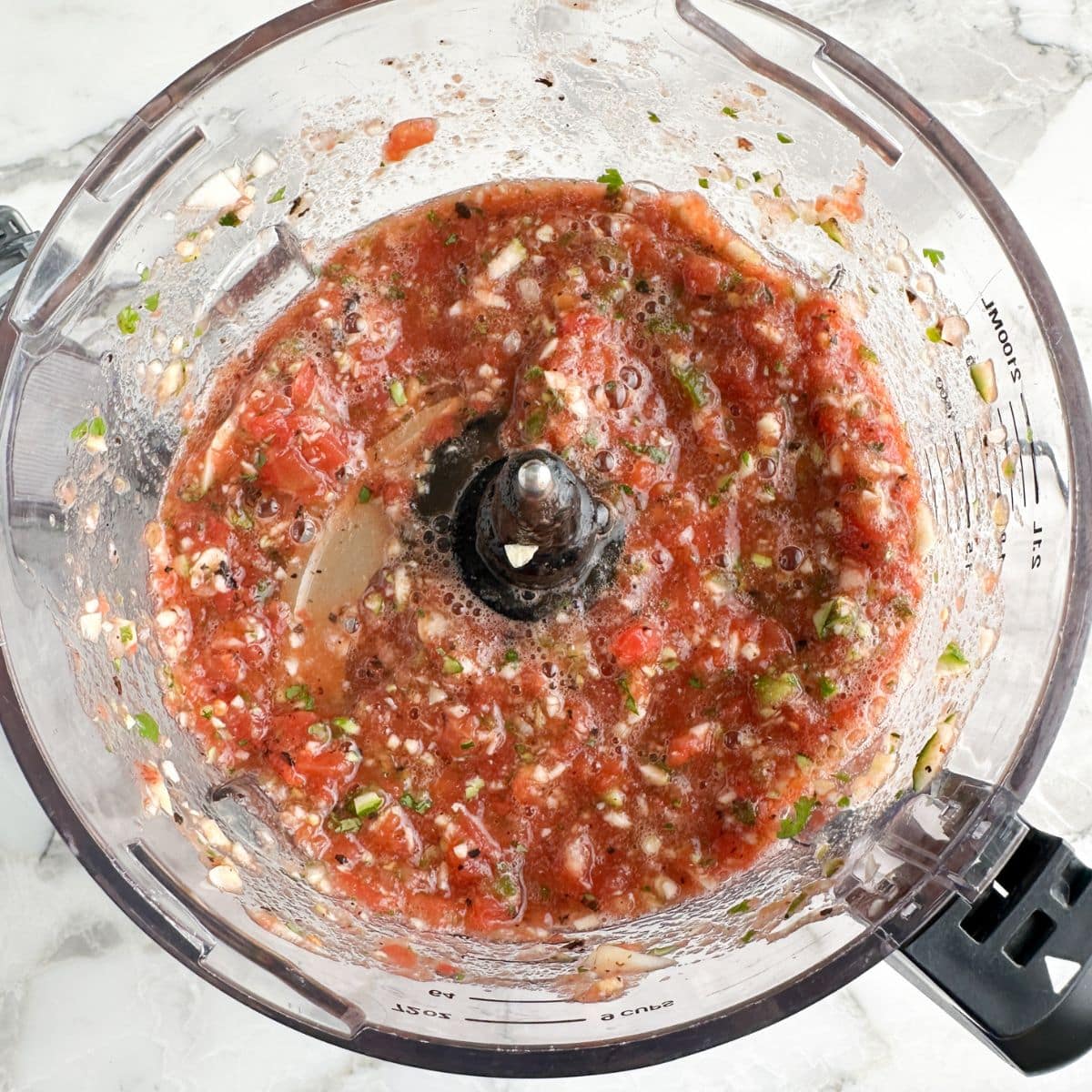 Food processor with salsa. 
