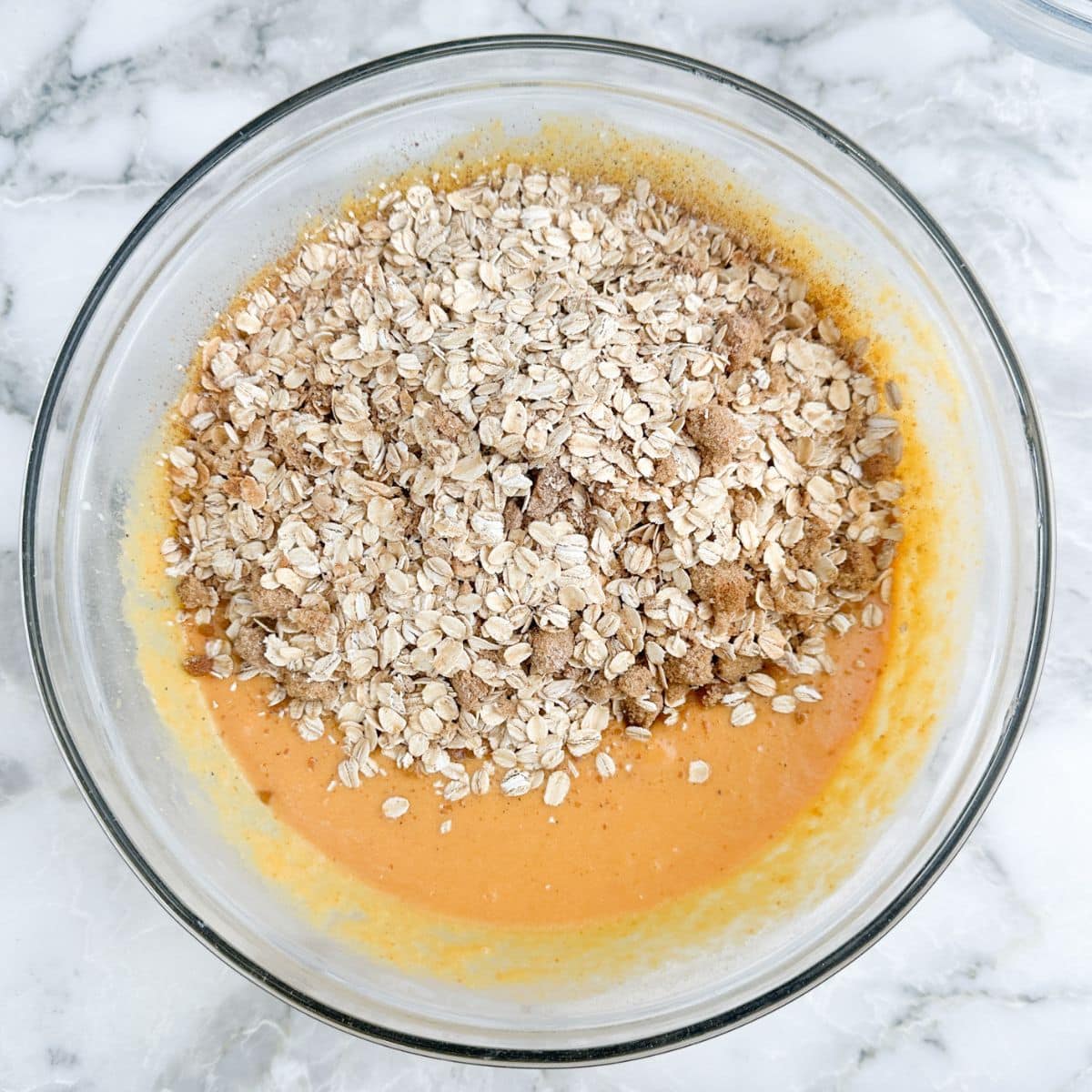 Bowl with pumpkin, oatmeal, and spices. 