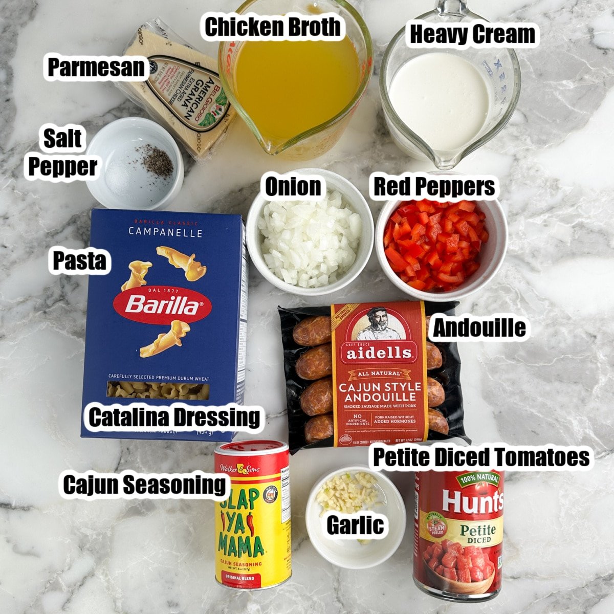 Box of pasta, cajun seasoning, diced tomatoes, broth, cream, onions, peppers, andouille sausage.