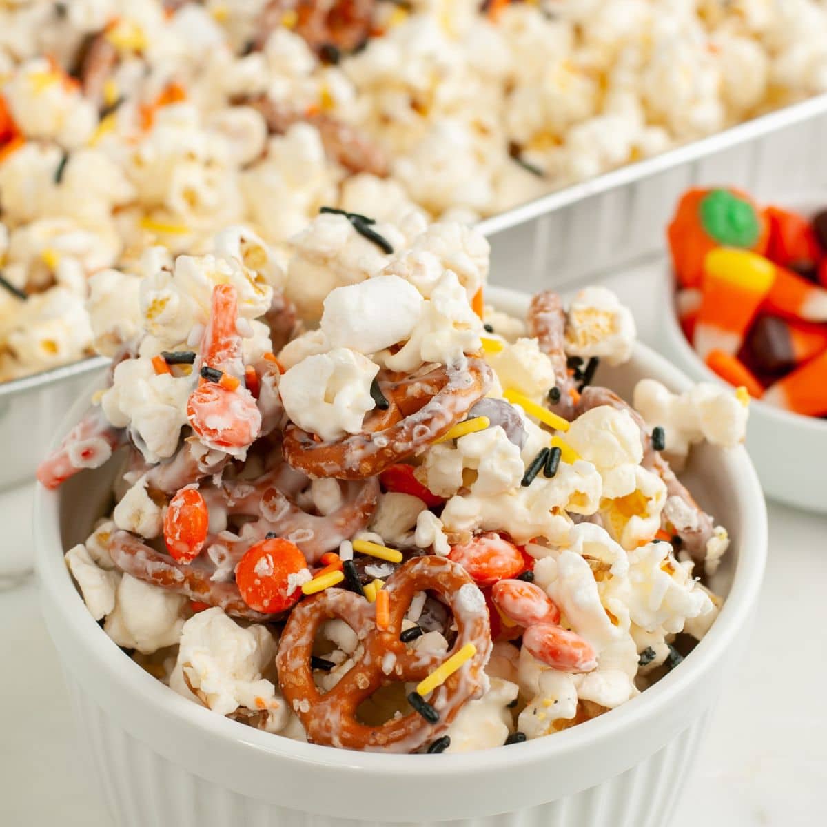 Bowl of fall popcorn snack mix.