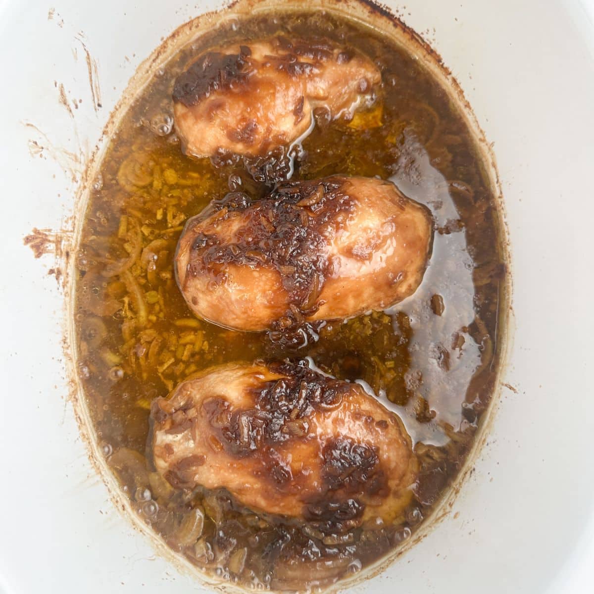 Slow cooker with French onion chicken.