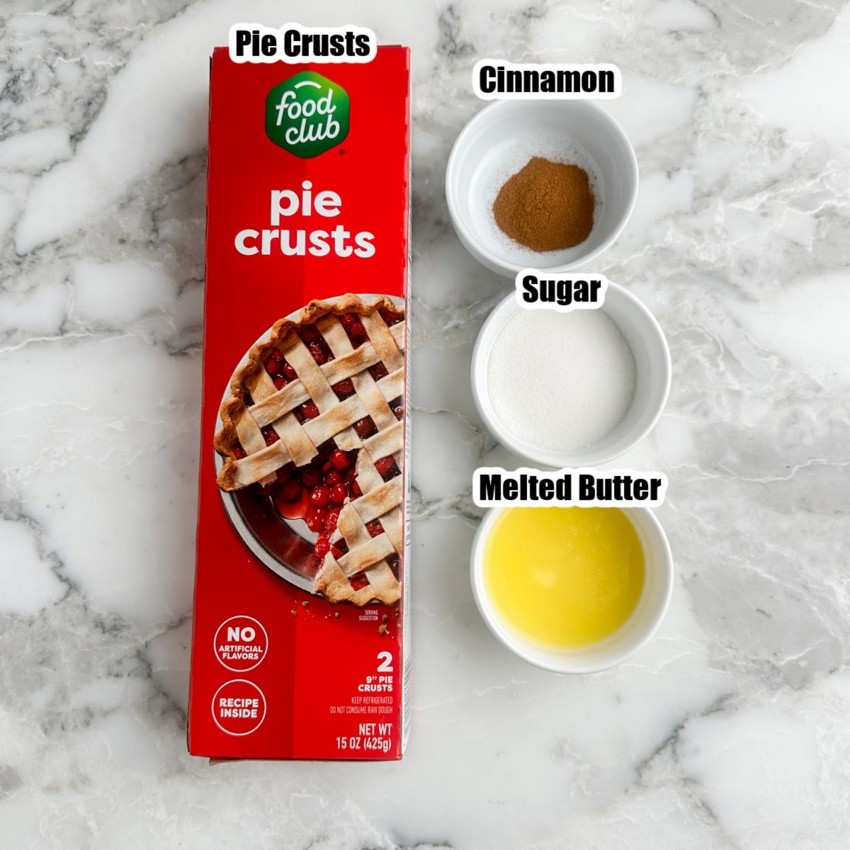 Pie crust, bowls of cinnamon, sugar, melted butter.