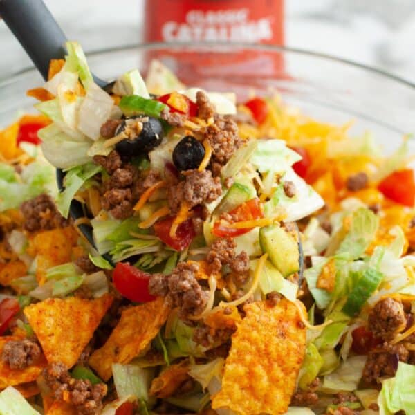 Spoon with taco salad.