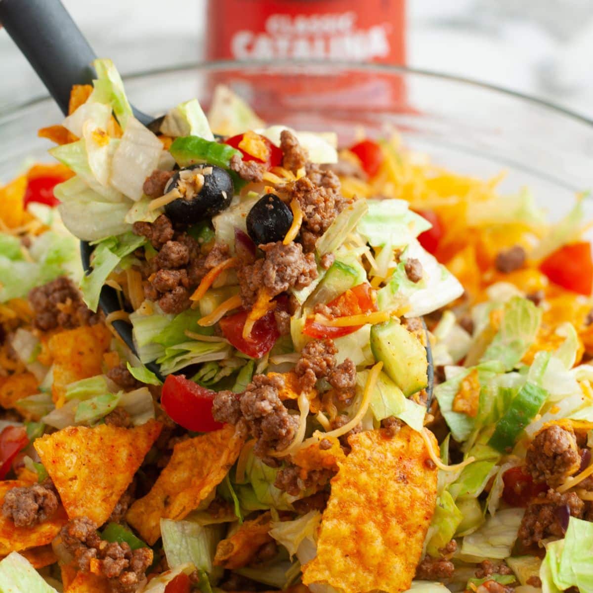 Spoon with taco salad.