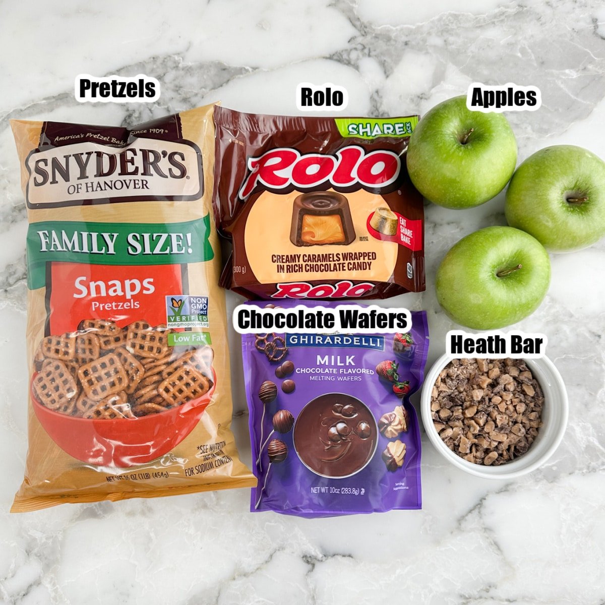 Bag of pretzels, Rolo candy, chocolate wagers, green apples, and crushed Heath Bar.