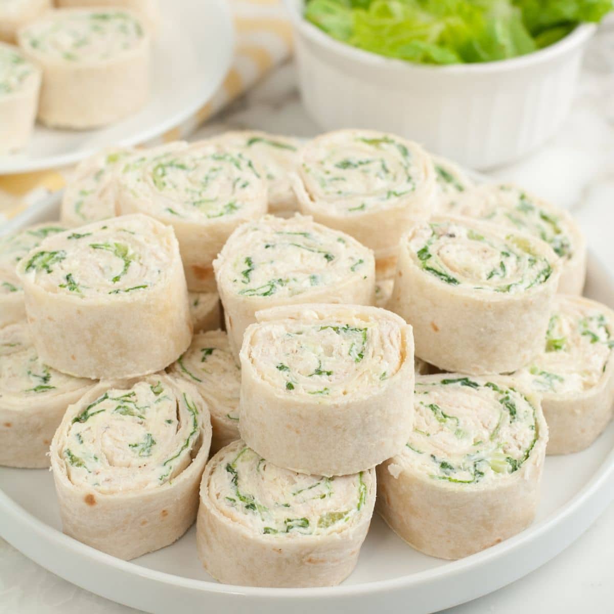 Plate of chicken caesar pinwheels. 