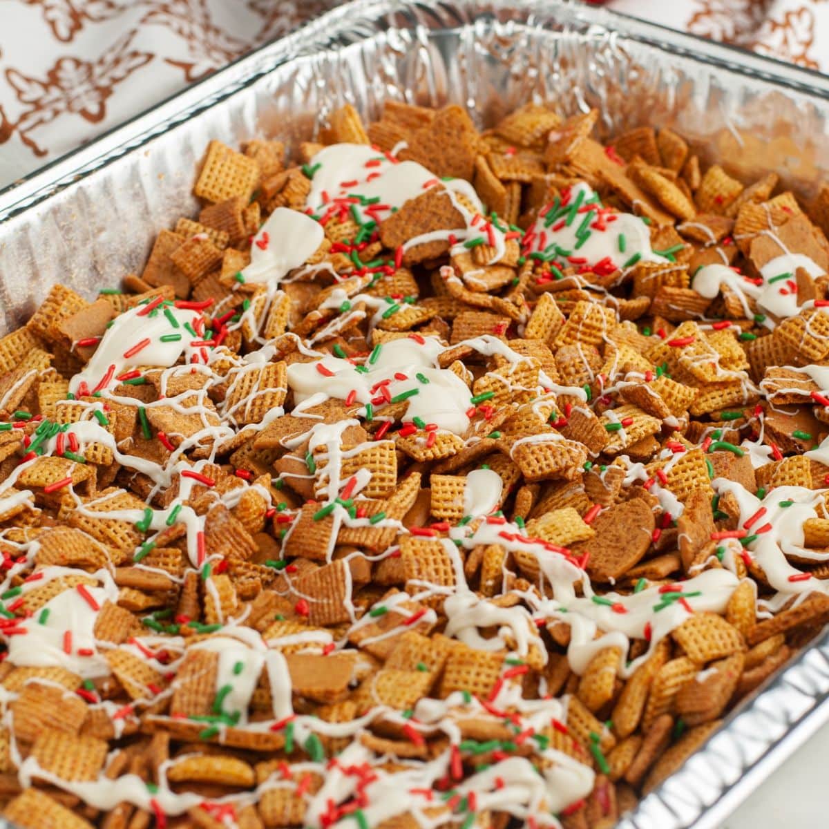 Pan of gingerbread Chex mix. 