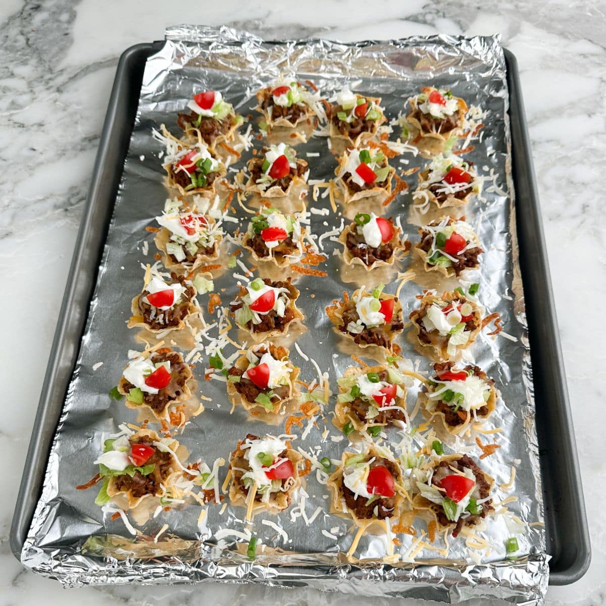 Baking pan with taco bites.