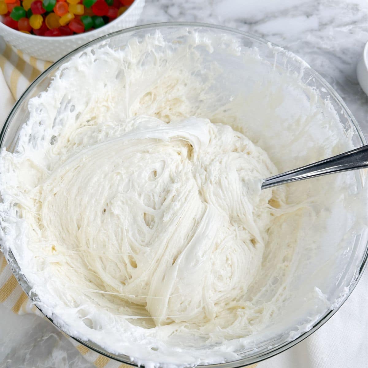 Bowl of melted marshmallows and white chocolate chips.