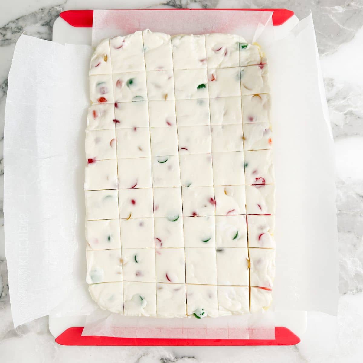Sliced nougat candy on a cutting board. 