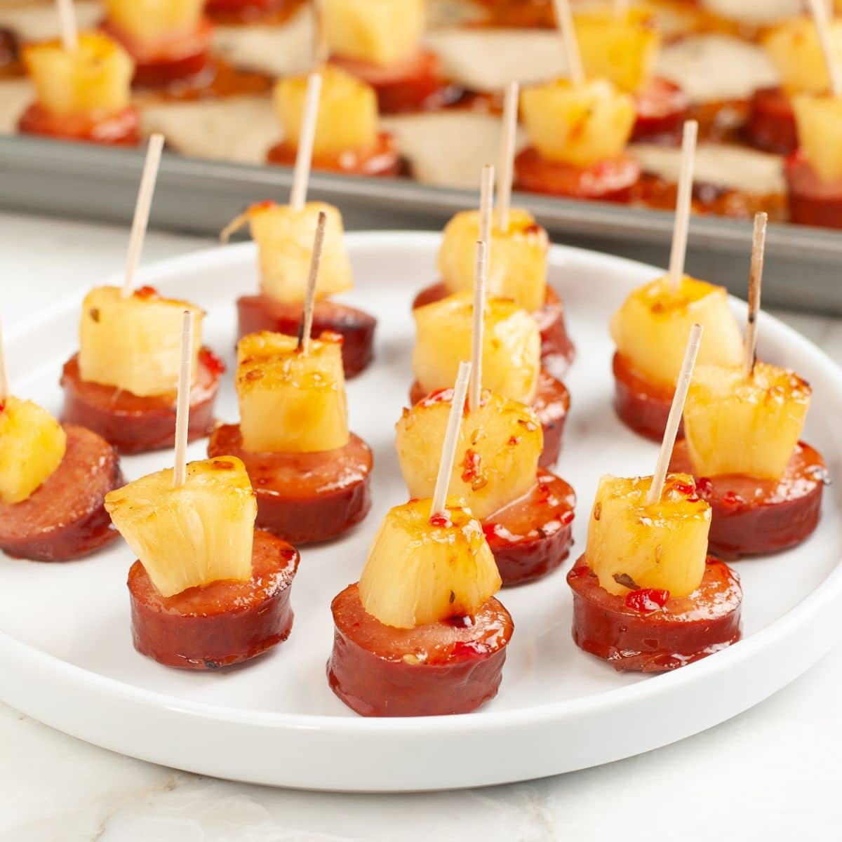 Plate of kielbasa pineapple bites.
