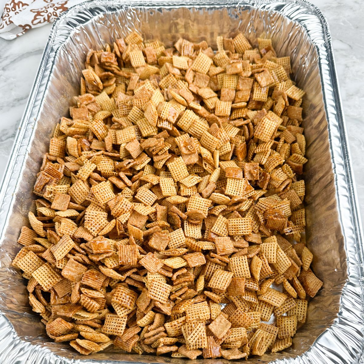 Pan with Chex mix. 